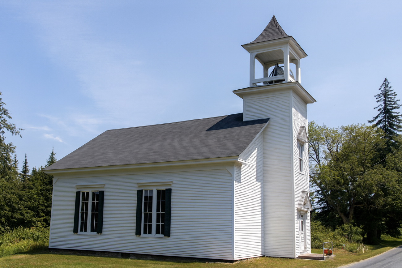 White Baptist church on North Haven Island with steeple and bell